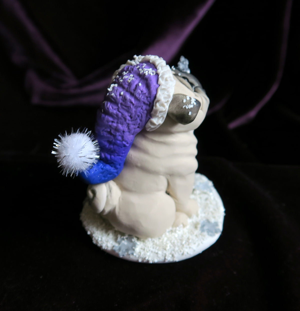 Catching Snowflakes Winter Pug Hand Sculpted Collectible