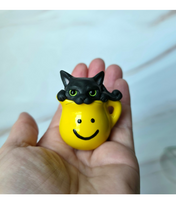 Load image into Gallery viewer, Black cat in Pitcher Hand Scuplted Clay Collectible