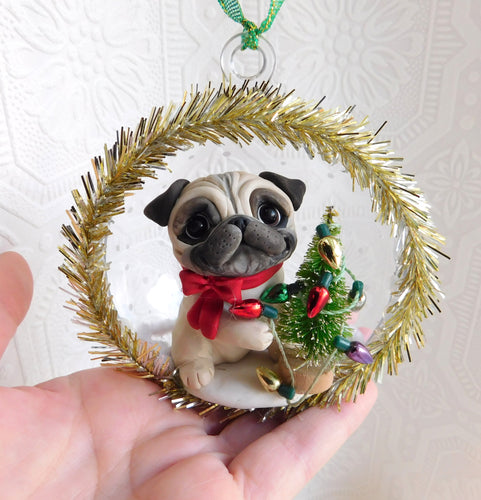 Pug Decorating the tree Christmas ornament Hand Sculpted Collectible