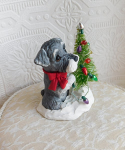 Schnauzer Decorating the Christmas tree Hand Sculpted Collectible