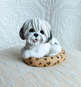Coton de Tulear in leopard print dog bed hand sculpted Collectible