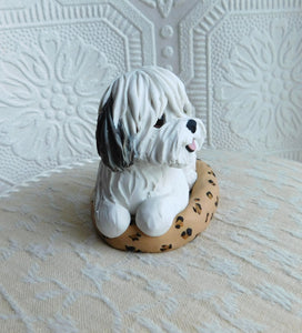 Coton de Tulear in leopard print dog bed hand sculpted Collectible