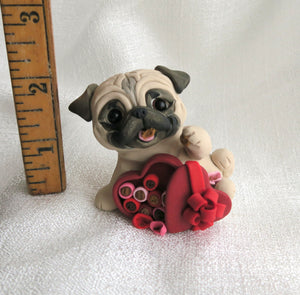 Valentine Pug getting into the candy box Hand Sculpted Collectible