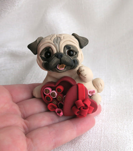 Valentine Pug getting into the candy box Hand Sculpted Collectible