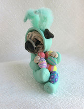 Load image into Gallery viewer, Light Turquoise Easter bunny suit Pug with Eggs Hand Sculpted Collectible