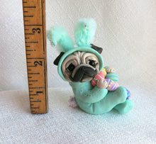 Load image into Gallery viewer, Light Turquoise Easter bunny suit Pug with Eggs Hand Sculpted Collectible