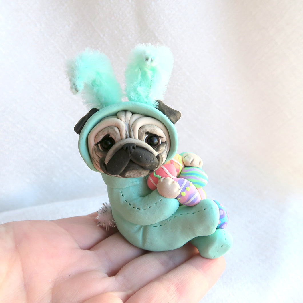 Light Turquoise Easter bunny suit Pug with Eggs Hand Sculpted Collectible