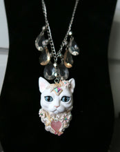 Load image into Gallery viewer, White Cat with Butterflies, Flowers, Feathers, and Crystals Painted Pendant Necklace