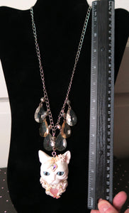 White Cat with Butterflies, Flowers, Feathers, and Crystals Painted Pendant Necklace