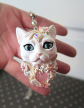 Load image into Gallery viewer, White Cat with Butterflies, Flowers, Feathers, and Crystals Painted Pendant Necklace