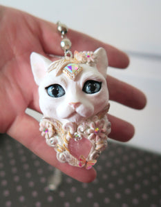 White Cat with Butterflies, Flowers, Feathers, and Crystals Painted Pendant Necklace