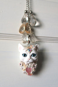 White Cat with Butterflies, Flowers, Feathers, and Crystals Painted Pendant Necklace