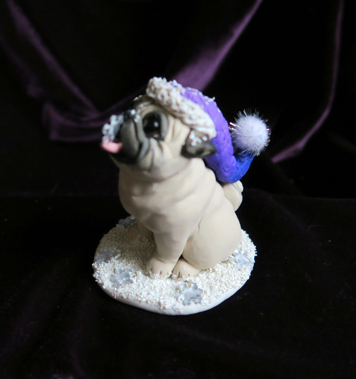 Catching Snowflakes Winter Pug Hand Sculpted Collectible