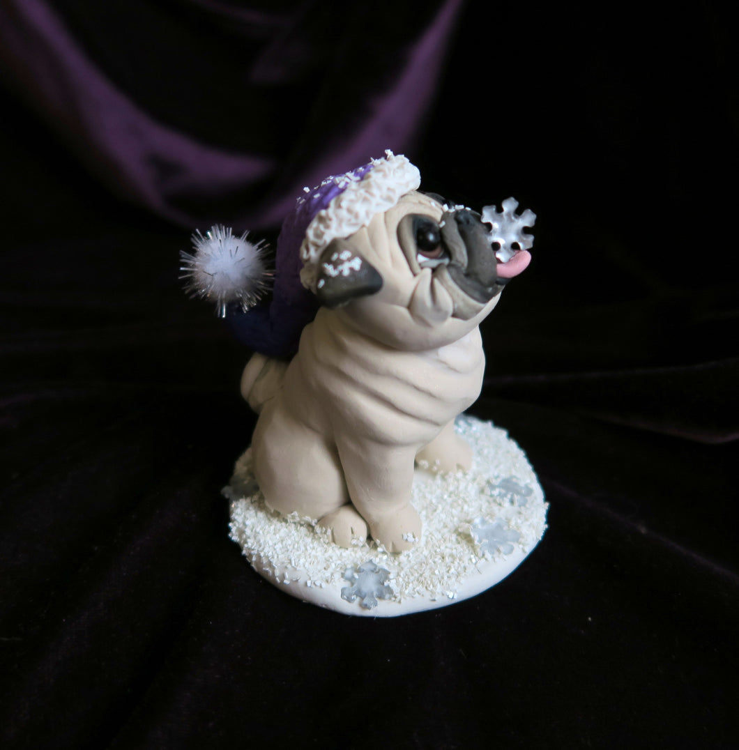 Catching Snowflakes Winter Pug Hand Sculpted Collectible