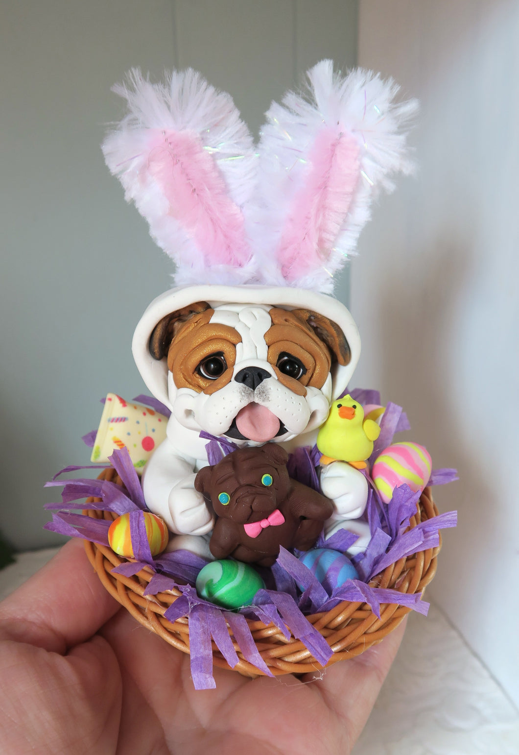 English Bulldog in Easter bunny suit in a Basket full of goodies Hand Sculpted Collectible