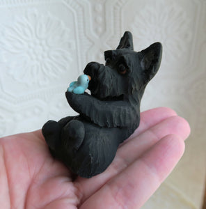 Scottish Terrier with Bird friend hand sculpted Collectible